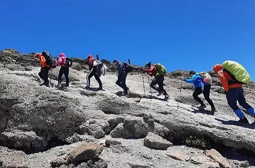 Climbing Kilimanjaro in June group departure 2024 jubilation